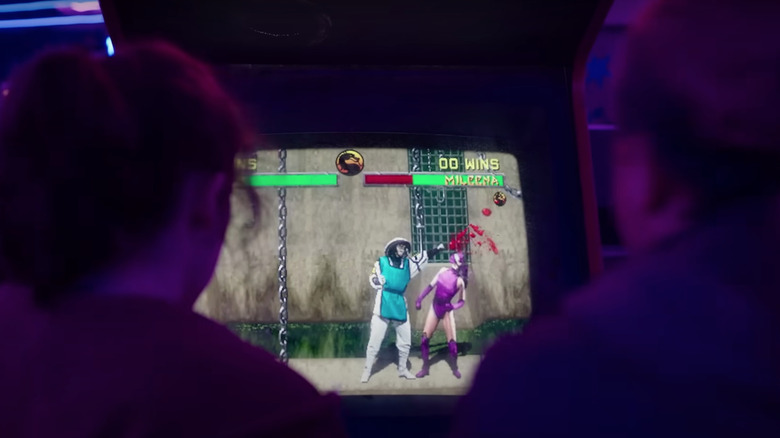 Riley and Ellie playing Mortal Kombat 