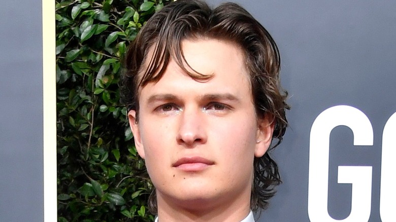 Ansel Elgort posing