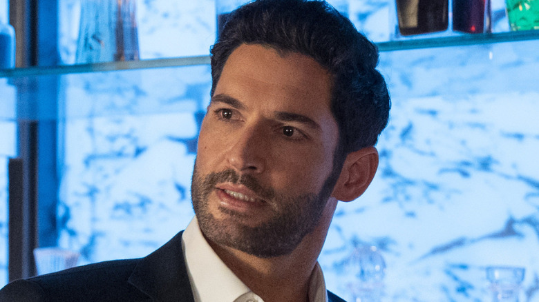 Lucifer tending bar