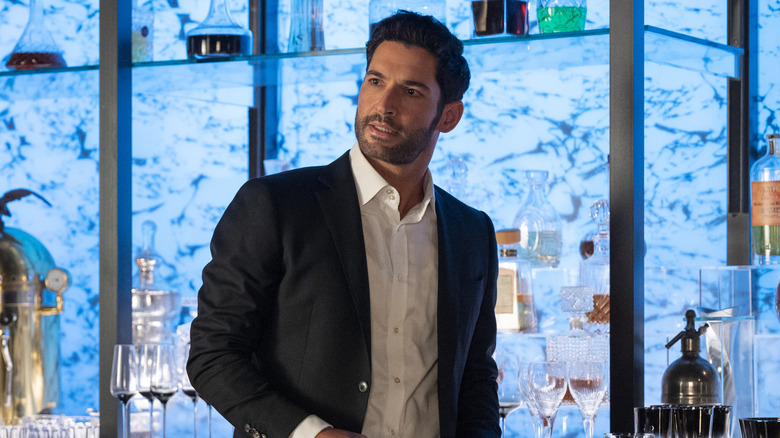 Lucifer tending bar