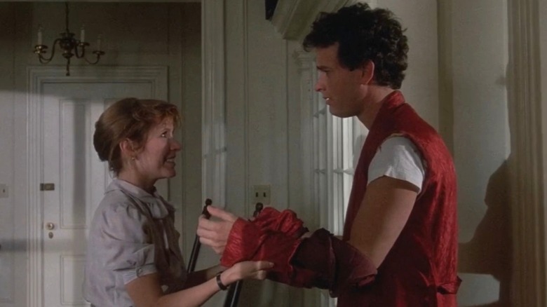 Paula ripping off Richard's sleeves in The Man with One Red Shoe (1985)