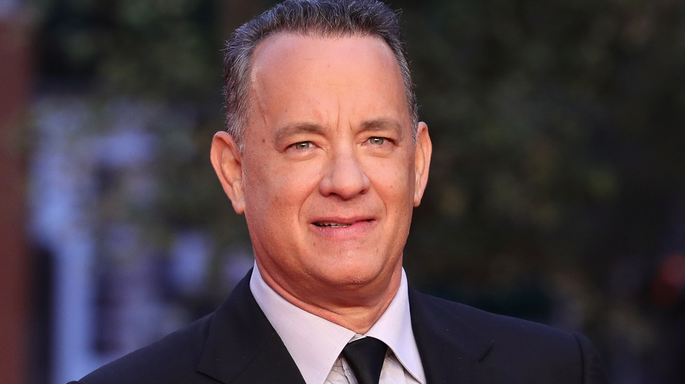 Tom Hanks as Mr. Rogers