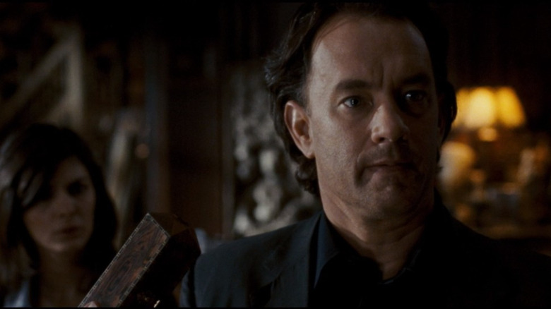 Tom Hanks holding clue
