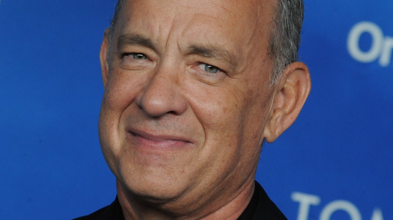 Tom Hanks smiles for the camera