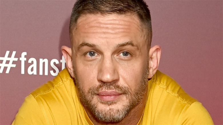Tom Hardy at event in yellow shirt