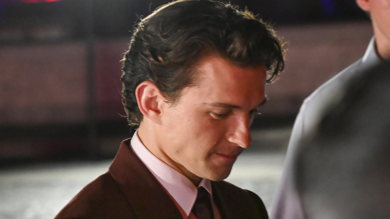Tom Holland wearing suit