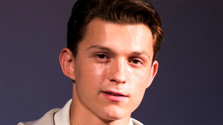 Tom Holland smirking