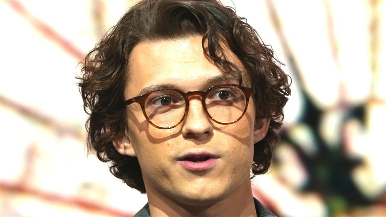 Tom Holland in glasses