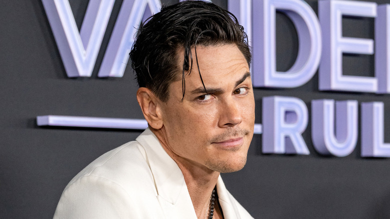 Tom Sandoval smirking