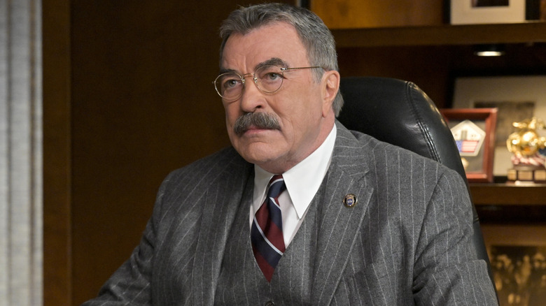 Frank Reagan from Blue Bloods sitting down