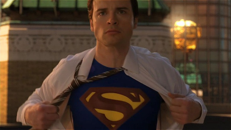 Clark Kent revealing Superman costume