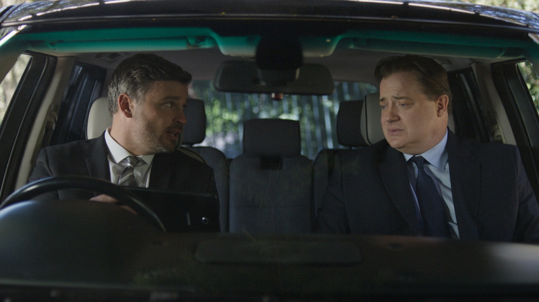 Vincent and Peter Swann in car