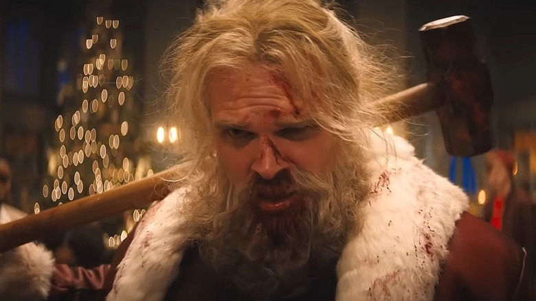 Santa Claus with a hammer