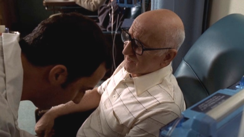 RN Collins putting an IV in Junior Soprano
