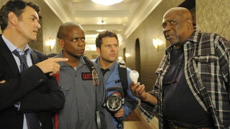 Shawn, Gus, and Lassie investigate with Lloyd