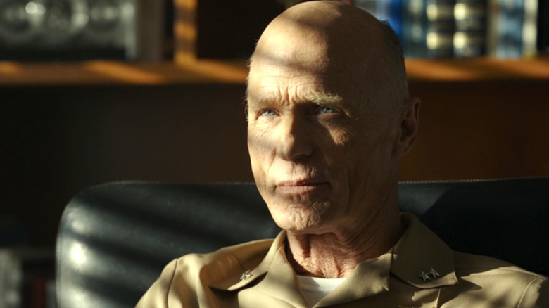 Ed Harris wears a Navy uniform