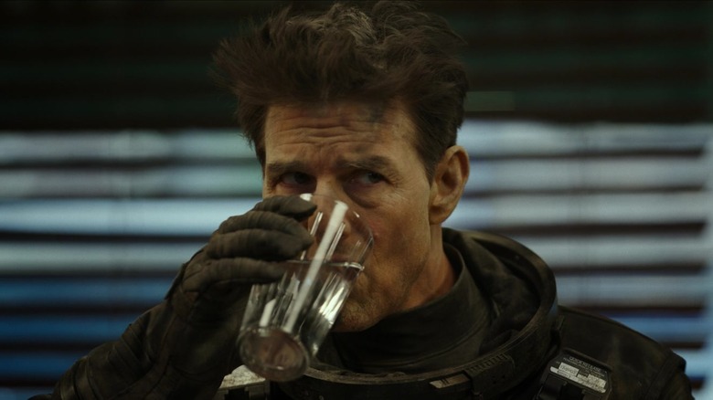 Maverick drinking water after crashing a jet