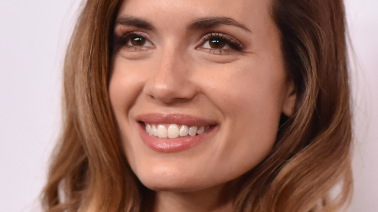 Torrey DeVitto smiling 