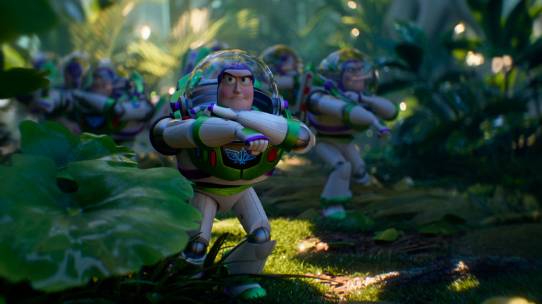A group of Buzz Lightyear toys moving through a forest in formation in "Toy Story 5" (2026)