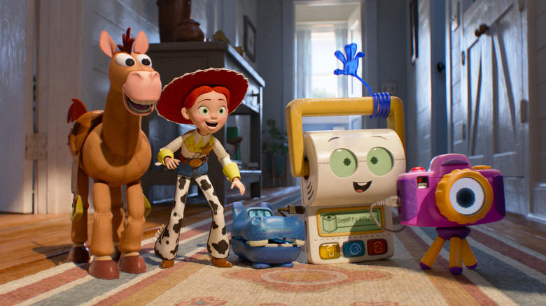 Jessie, Bullseye, Smarty Pants, Atlas, and Snappy all smiling in the hallway at Blaze's house in "Toy Story 5" (2026)