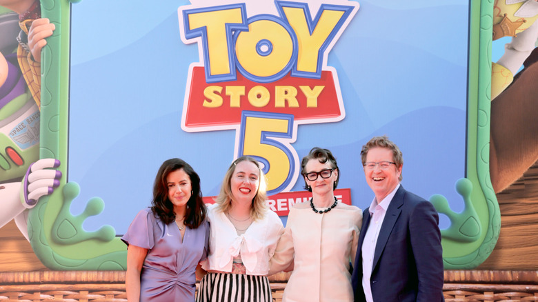 Lindsey Collins, Kenna Harris, Joan Cusack, and Andrew Stanton pose for photos on the "Toy Story 5" red carpet (2026)