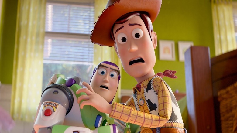 Buzz and Woody react in fear in Molly's room in 