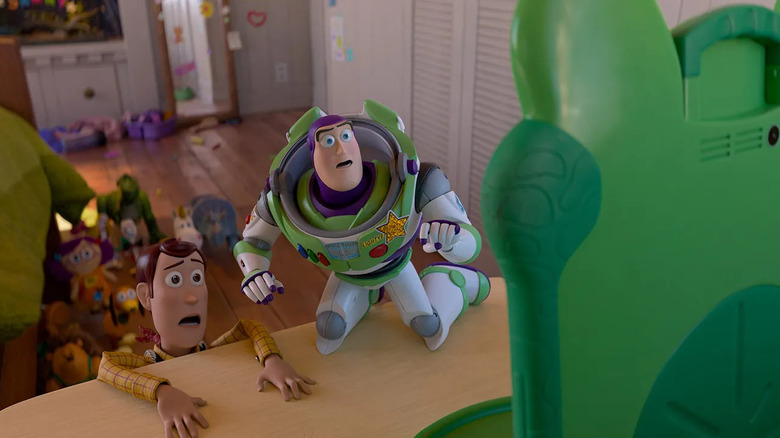 Andy and Buzz looking horrified at Lilypad in Toy Story 5