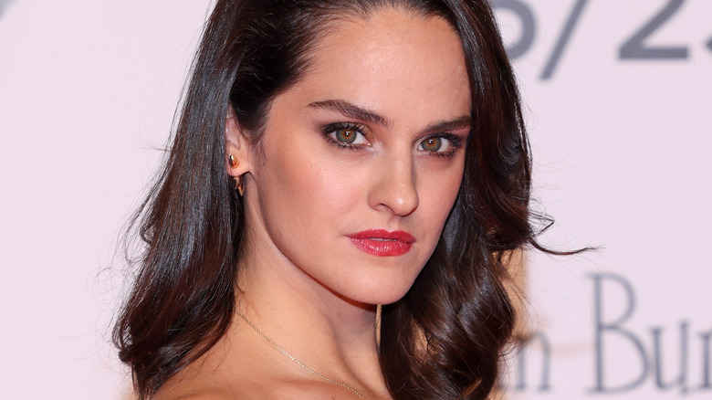 Noémie Merlant staring