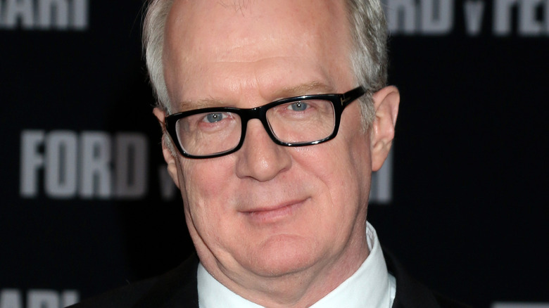 Tracy Letts wearing suit and glasses