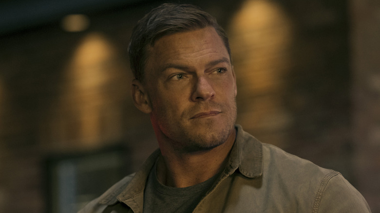 Jack Reacher looking to the side on "Reacher" (2022-present)