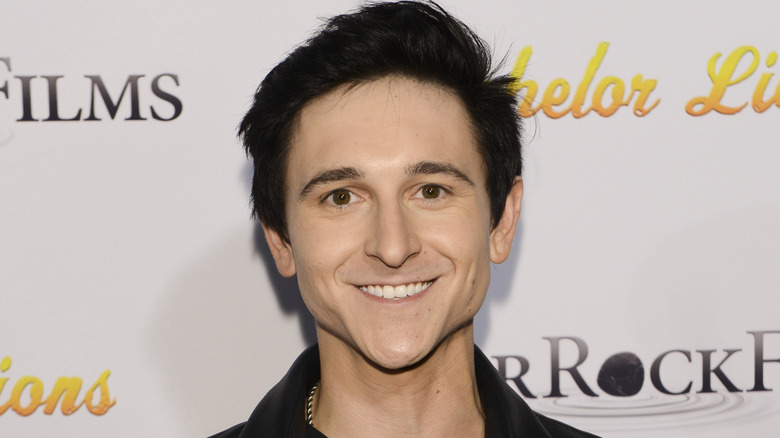 Mitchel Musso smiling at a Bachelor Lions Films premiere