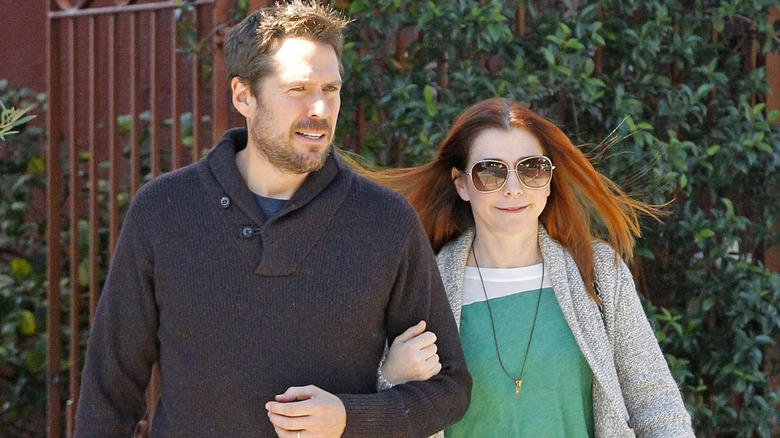 Alyson Hannigan and her husband, Alexis Denisof, at the Brentwood Country Mart 2013 in Los Angeles