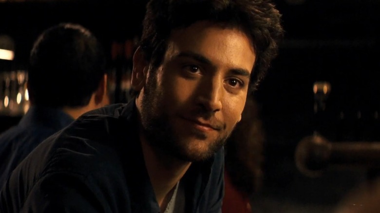 Sam sitting at a bar in Happythankyoumoreplease (2010)