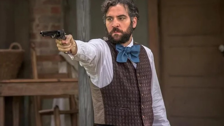 Dr. Foster holding gun in Mercy Street (2016)