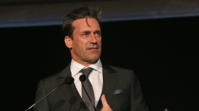 Jon Hamm speaking at a bridge in 2017