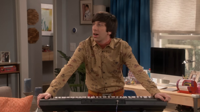 Howard Wolowitz standing over a keyboard in The Big Bang Theory