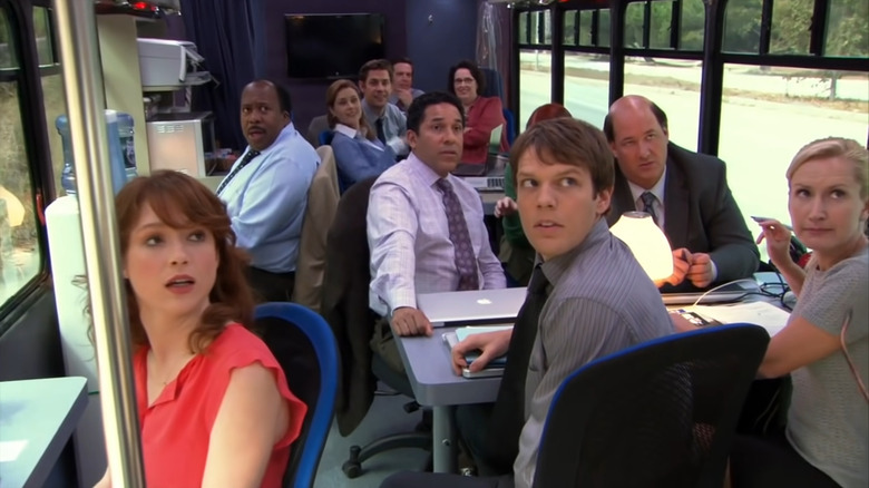 The Office cast in mobile work bus