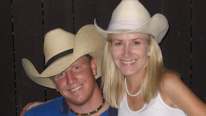 John and Angela Kinsey smiling together in cowboy hats