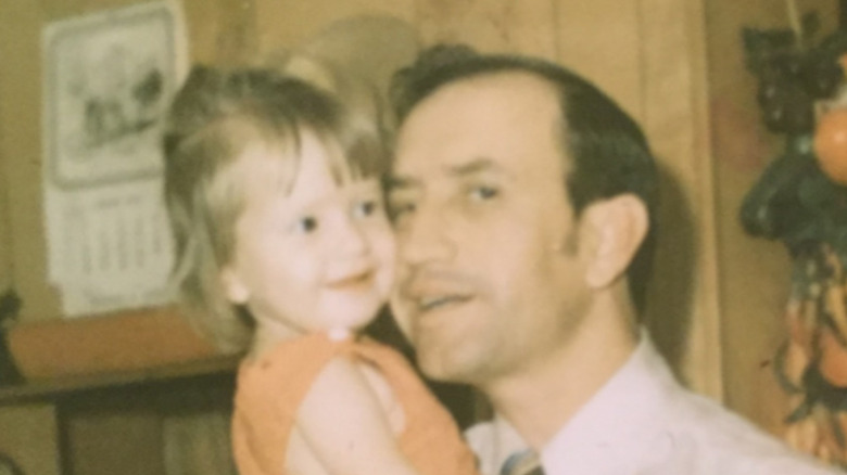 Angela Kinsey as a child with her dad