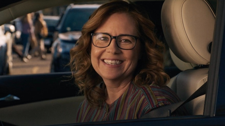 Ms. Heron smiling in a car in "Mean Girls" (2024)