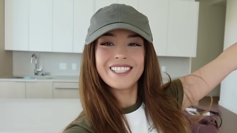 Valkyrae smiling and raising her arm