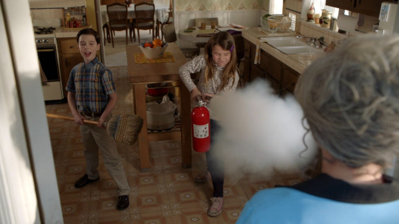 Missy using a fire extinguisher on Meemaw on Young Sheldon