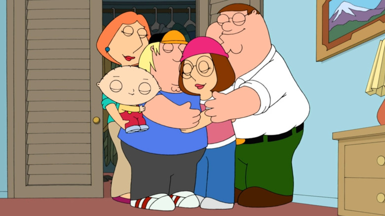 The Griffins group hugging