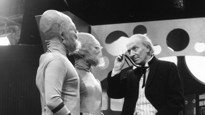 First Doctor looking at aliens