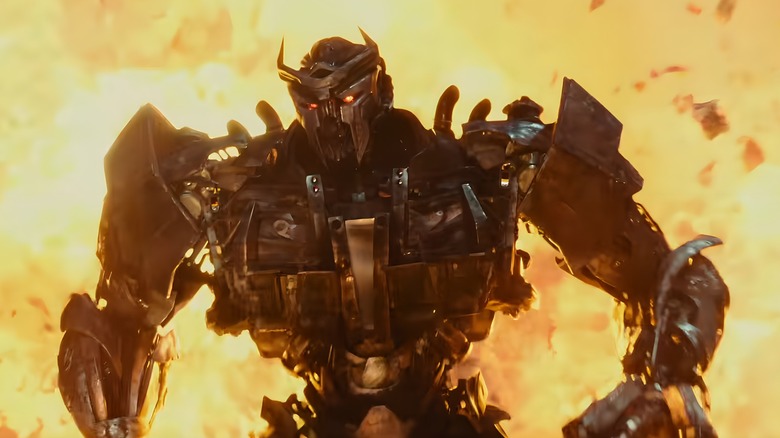 Scourge walks away from a fiery explosion