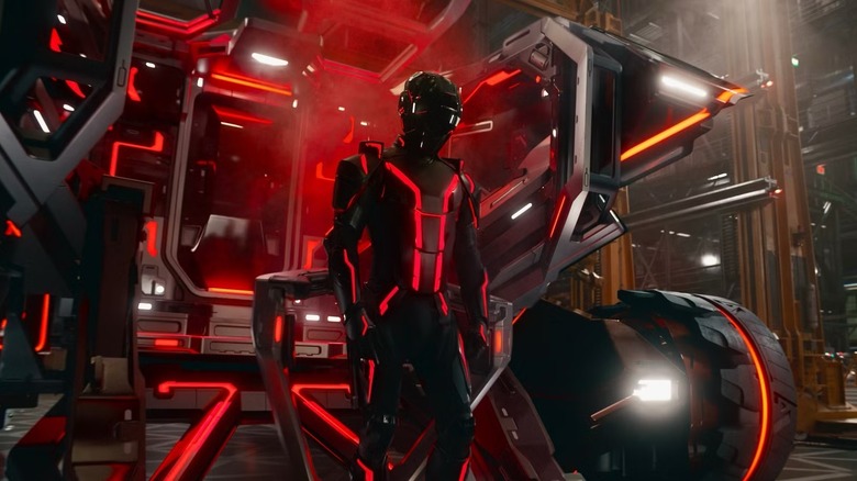 Ares exiting a Grid vehicle in Tron: Ares