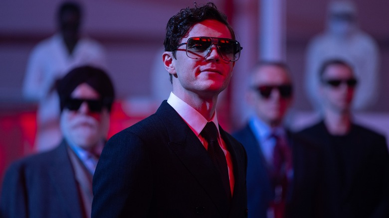 Julian Dillinger wearing sunglasses with his henchmen