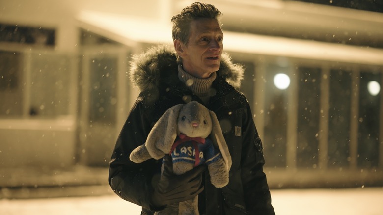 Hank holds the stuffed bunny
