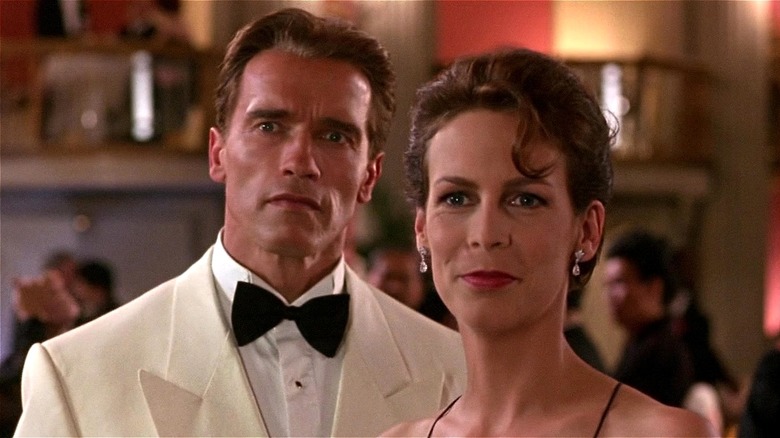 Harry and Helen looking intrigued at the end of True Lies