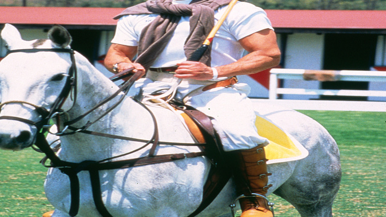 Sylvester Stallone riding polo horse